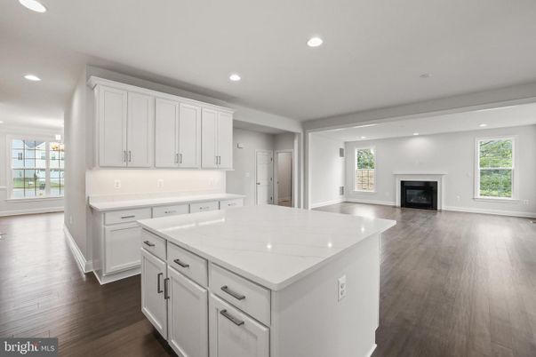 Empty room, Fireplace, Interior, Kitchen, Recessed Lighting, Wood Texture Flooring
