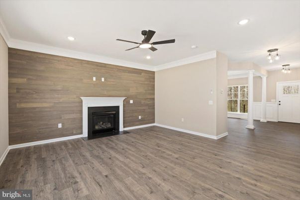 Empty room, Fireplace, Interior, Recessed Lighting, Wood Texture Flooring, Wooden Walls