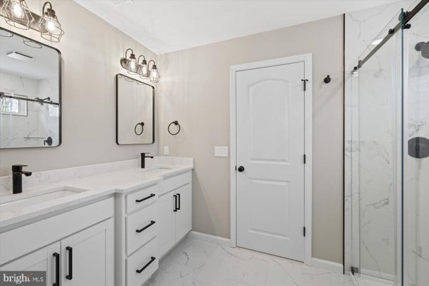 Bathroom, Dual Sink Vanities, Glass Shower, Interior, Marble, Marble Walls