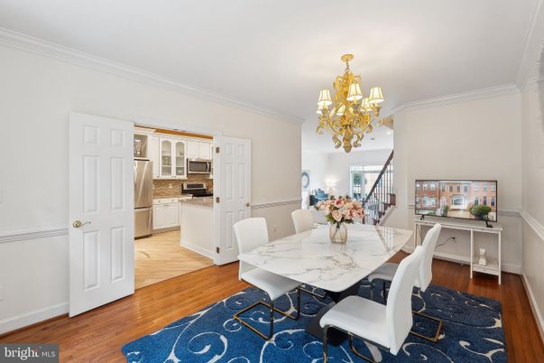 Chandelier, Dining room, Interior, Kitchen, Stainless Steel Appliances, Wood Texture Flooring
