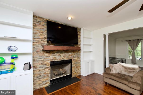 Fireplace, Interior, Recessed Lighting, Stone Walls, Wood Texture Flooring