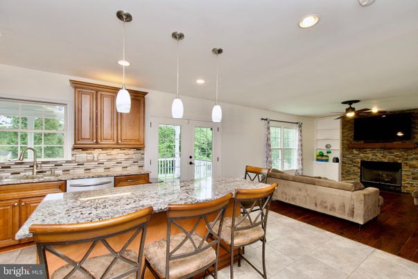 Fireplace, Interior, Kitchen, Living room, Pendant Lights, Recessed Lighting, Stone Walls, Wood Texture Flooring