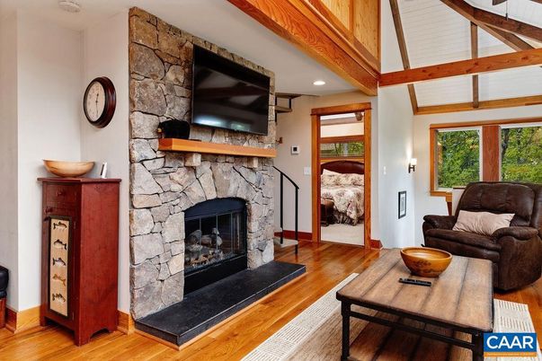 Fireplace, Interior, Living room, Recessed Lighting, Stone Walls, Wooden Beams, Wood Texture Flooring