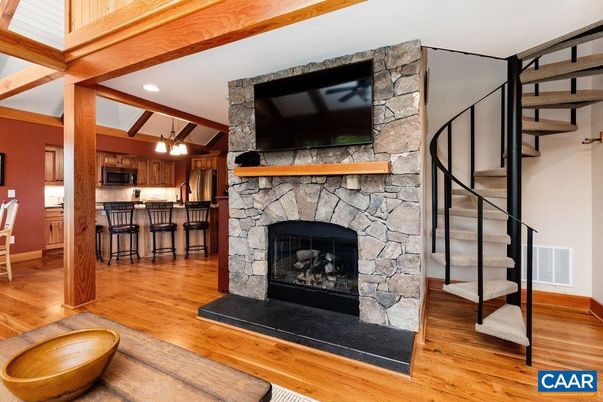 Fireplace, Interior, Kitchen, Recessed Lighting, Stone Walls, Wood Texture Flooring