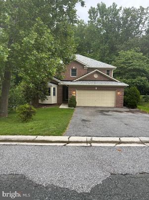Attached, Exterior, Facade, Brick Facade, Cape Cod