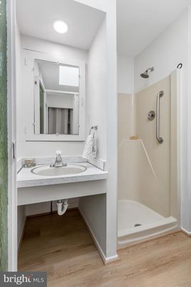 Bathroom, Dual Sink Vanities, Interior, Recessed Lighting, Wood Texture Flooring