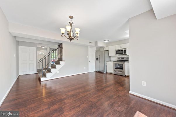 Chandelier, Empty room, Interior, Kitchen, Stainless Steel Appliances, Wood Texture Flooring