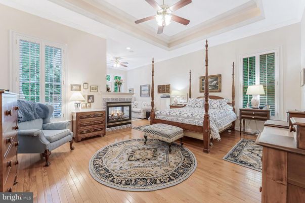 Bedroom, Fireplace, Interior, Recessed Lighting, Wood Texture Flooring