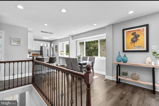 Dining room, Interior, Kitchen, Pendant Lights, Recessed Lighting, Stainless Steel Appliances, Wood Texture Flooring