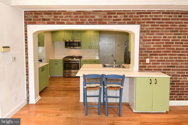 Interior, Kitchen, Stainless Steel Appliances, Stone Walls, Wood Texture Flooring