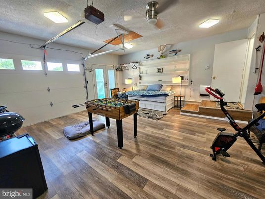 Fitness Equipment, Game Room, Interior, Wood Texture Flooring