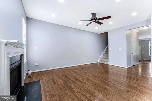 Empty room, Fireplace, Interior, Recessed Lighting, Wood Texture Flooring