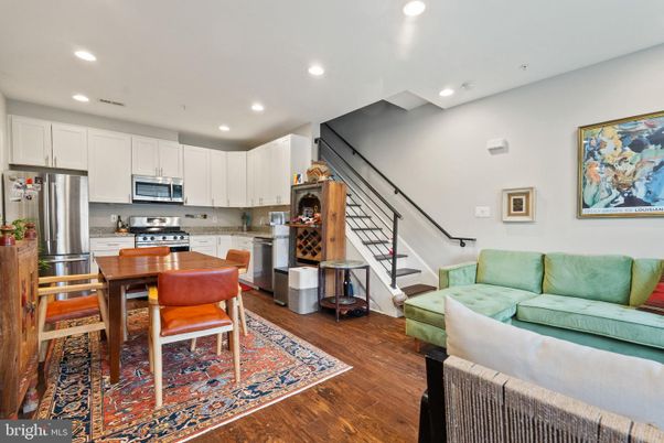 Dining room, Interior, Kitchen, Living room, Recessed Lighting, Stainless Steel Appliances, Wood Texture Flooring