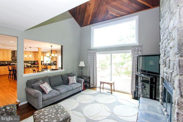 Fireplace, Interior, Kitchen, Living room, Pendant Lights, Recessed Lighting, Stone Walls, Wood Texture Flooring