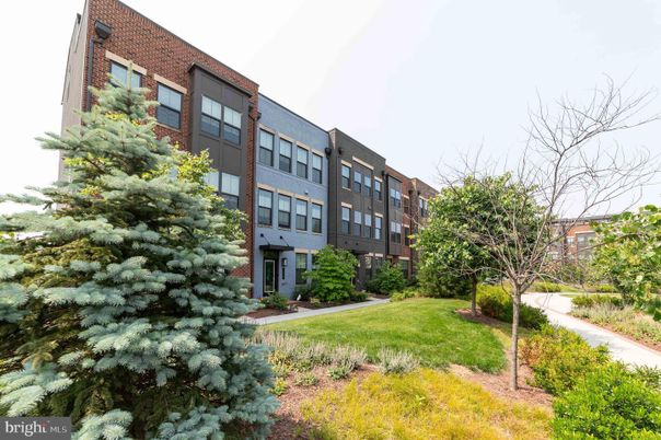 Backyard, Exterior, Facade, Brick Facade, Condo Building