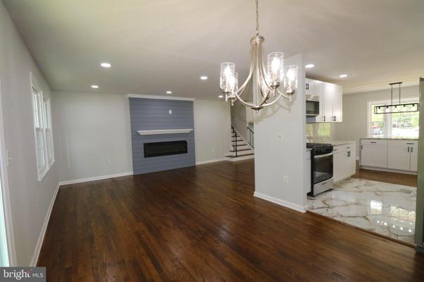 Chandelier, Fireplace, Interior, Kitchen, Marble, Pendant Lights, Recessed Lighting, Wood Texture Flooring