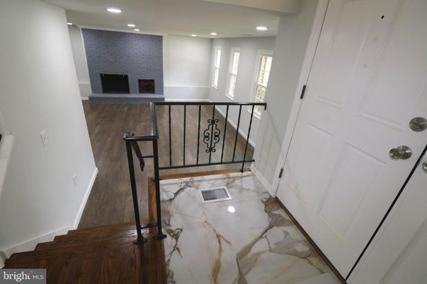 Fireplace, Interior, Marble, Recessed Lighting, Stone Walls