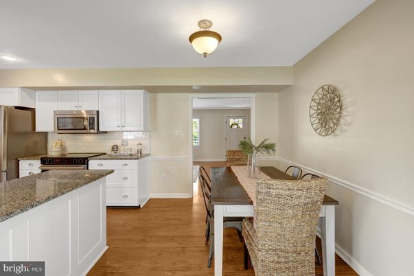 Dining room, Interior, Kitchen, Recessed Lighting, Stainless Steel Appliances, Wood Texture Flooring