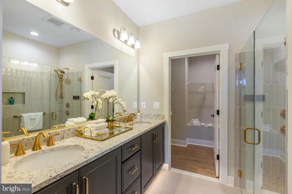 Bathroom, Dual Sink Vanities, Glass Shower, Interior, Recessed Lighting, Wood Texture Flooring