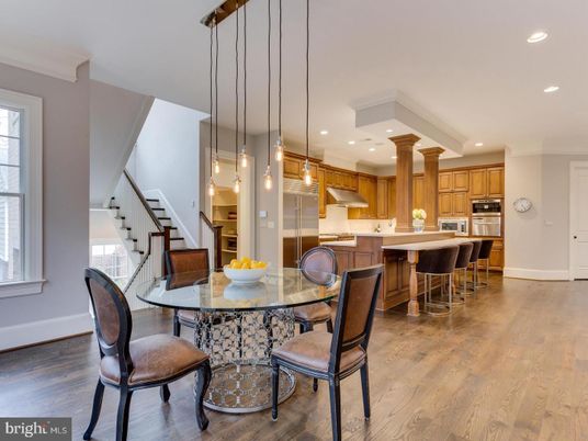 Dining room, Interior, Kitchen, Pendant Lights, Recessed Lighting, Stainless Steel Appliances, Wood Texture Flooring