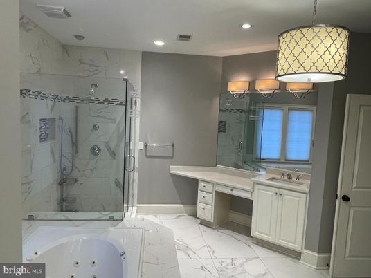 Bathroom, Dual Sink Vanities, Glass Shower, Interior, Marble, Marble Walls, Recessed Lighting