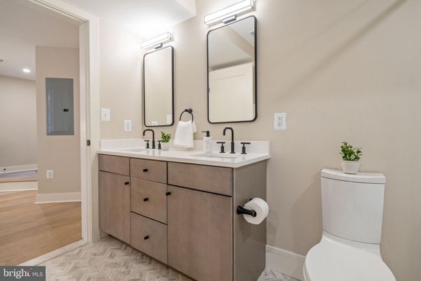 Bathroom, Dual Sink Vanities, Interior, Recessed Lighting, Wood Texture Flooring