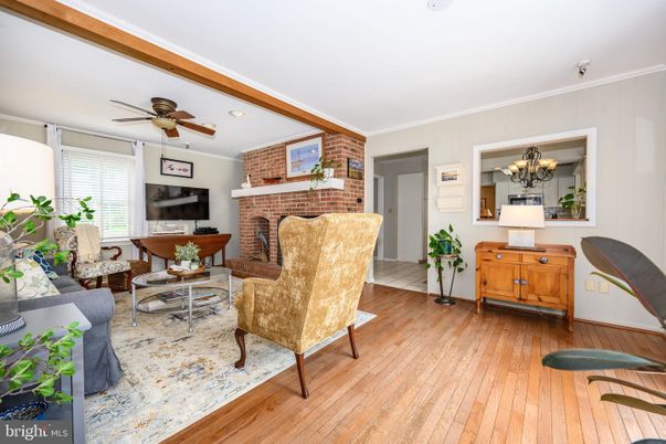 Fireplace, Interior, Living room, Recessed Lighting, Stone Walls, Wood Texture Flooring