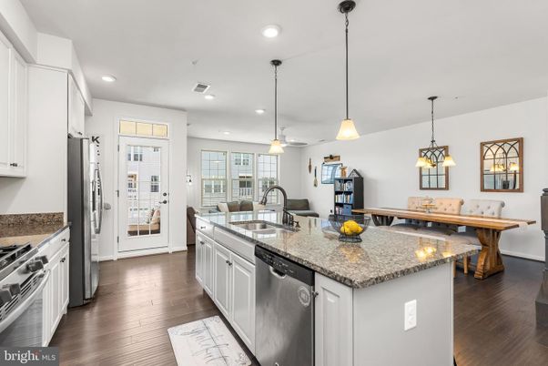 Dining room, Interior, Kitchen, Living room, Pendant Lights, Recessed Lighting, Stainless Steel Appliances, Wood Texture Flooring