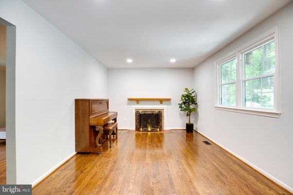 Fireplace, Interior, Piano, Recessed Lighting, Wood Texture Flooring