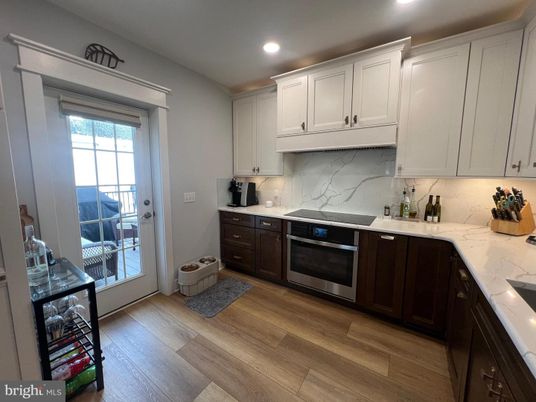Interior, Kitchen, Marble Walls, Recessed Lighting, Wood Texture Flooring