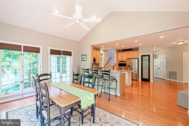 Dining room, Interior, Kitchen, Recessed Lighting, Stainless Steel Appliances, Wood Texture Flooring