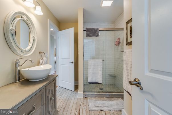 Bathroom, Glass Shower, Interior, Recessed Lighting, Wood Texture Flooring