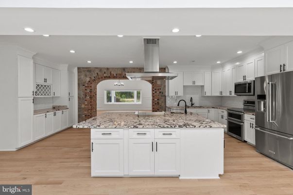 Interior, Kitchen, Recessed Lighting, Stainless Steel Appliances, Stone Walls, Wood Texture Flooring