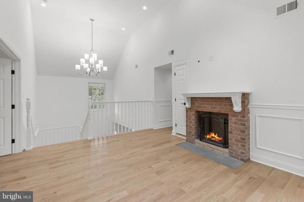 Chandelier, Fireplace, Interior, Recessed Lighting, Wood Texture Flooring