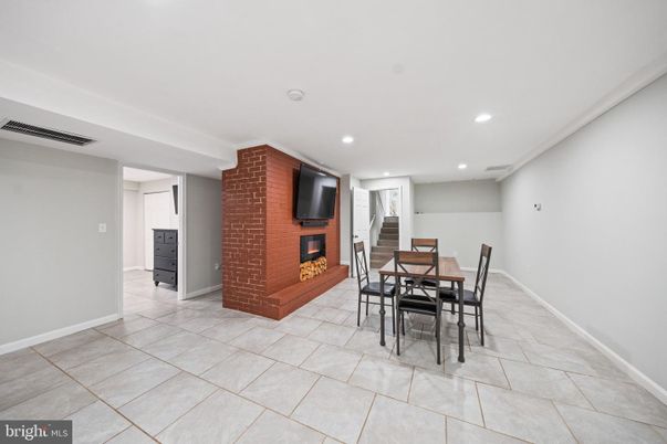 Dining room, Fireplace, Interior, Recessed Lighting, Stone Walls