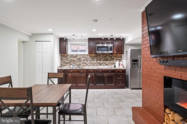 Dining room, Fireplace, Interior, Kitchen, Recessed Lighting, Stainless Steel Appliances