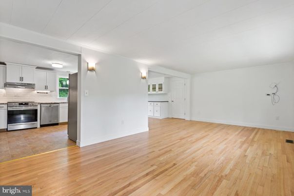 Empty room, Interior, Kitchen, Stainless Steel Appliances, Wood Texture Flooring