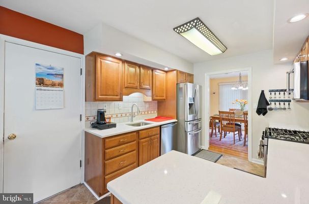 Dining room, Interior, Kitchen, Recessed Lighting, Stainless Steel Appliances, Wood Texture Flooring