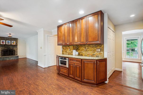 Fireplace, Interior, Kitchen, Recessed Lighting, Wood Texture Flooring