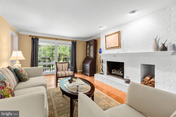 Fireplace, Interior, Living room, Recessed Lighting, Stone Walls, Wood Texture Flooring