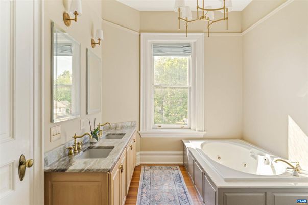 Bathroom, Chandelier, Dual Sink Vanities, Interior, Wood Texture Flooring