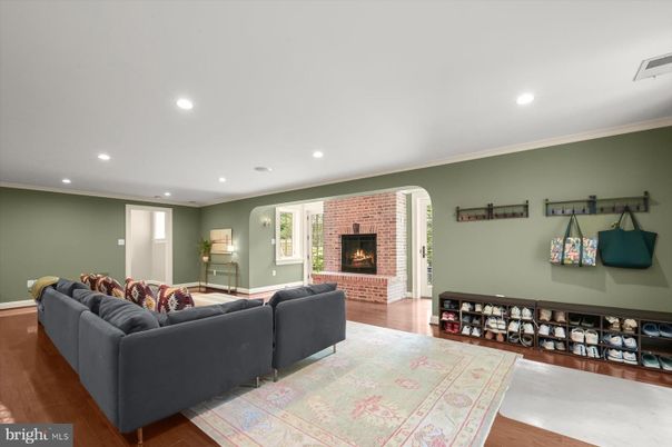 Fireplace, Interior, Living room, Recessed Lighting, Stone Walls, Wood Texture Flooring