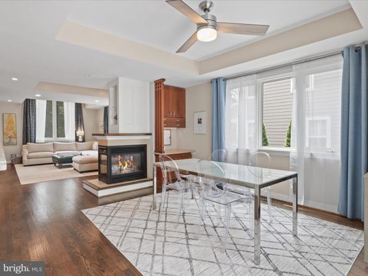 Dining room, Fireplace, Interior, Living room, Recessed Lighting, Wood Texture Flooring