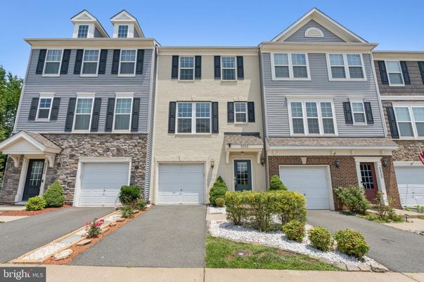 Attached, Exterior, Facade, Brick Facade, Rowhouse