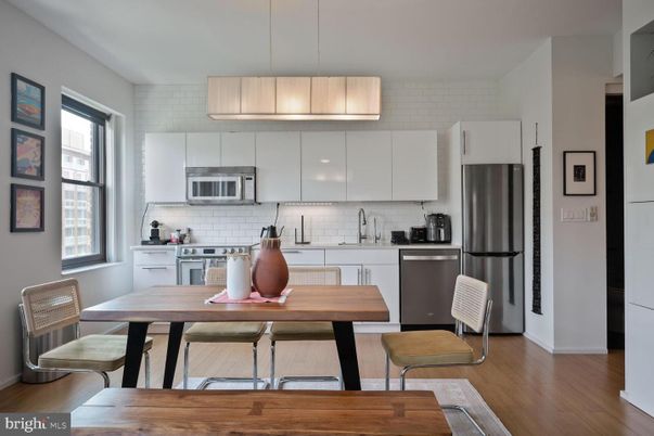 Dining room, Interior, Kitchen, Pendant Lights, Stainless Steel Appliances, Stone Walls, Wood Texture Flooring