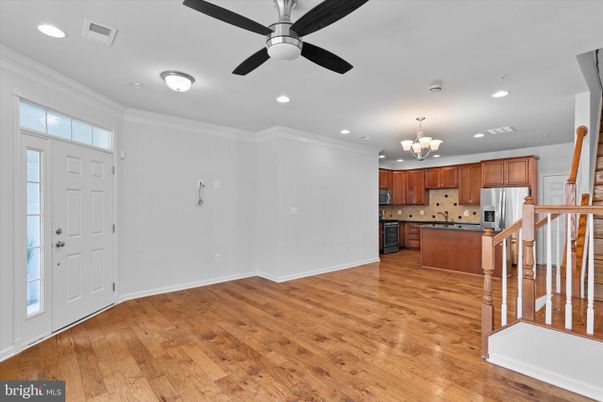 Chandelier, Interior, Kitchen, Recessed Lighting, Stainless Steel Appliances, Wood Texture Flooring