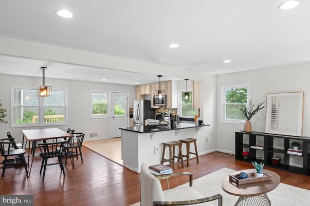 Dining room, Interior, Kitchen, Pendant Lights, Recessed Lighting, Stainless Steel Appliances, Wood Texture Flooring