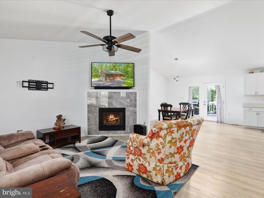 Dining room, Fireplace, Interior, Living room, Pendant Lights, Wood Texture Flooring