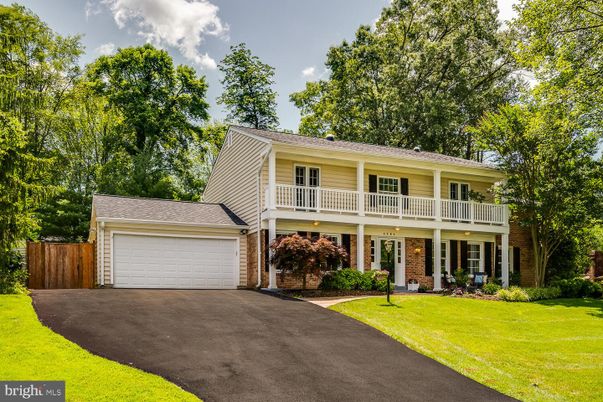 Attached, Detached Garage, Exterior, Facade, Brick Facade, Raised Ranch