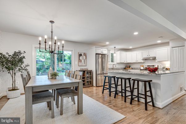 Dining room, Interior, Kitchen, Pendant Lights, Recessed Lighting, Stainless Steel Appliances, Wood Texture Flooring